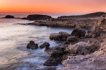 Fototapeta na wymiar Sunrise on the coast of Escullos. Natural Park of Cabo de Gata. Spain.