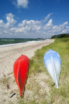 Fototapeta Canoes on the beach