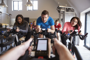 Instructor’s POV of spinning class at a gym