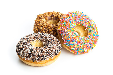 various donuts on white background