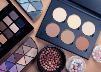 Set of decorative cosmetics on light color background