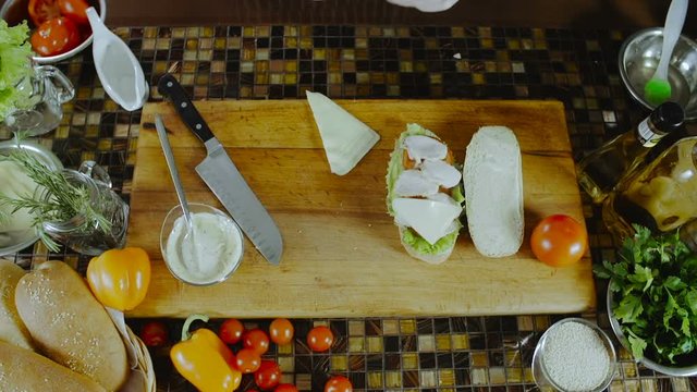 Chef Adds Cheese to the Sandwich