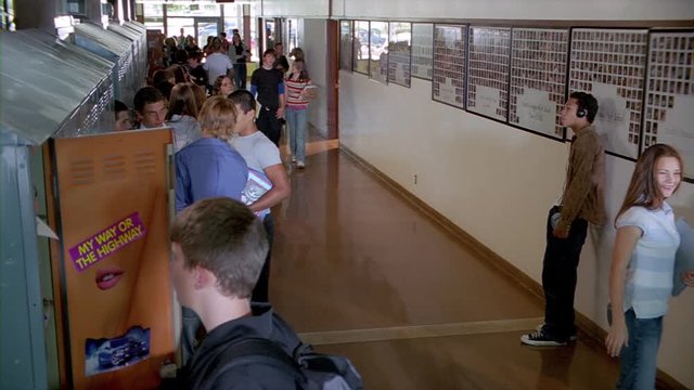 Raised view of high school hallway during a break between classes