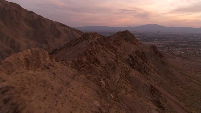 Flying above Sunrise Mountain with Las Vegas in distance