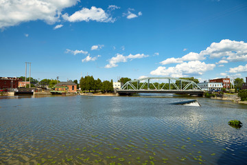Fototapeta premium Bridge across the pond in the park