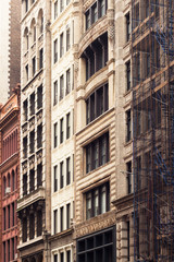 Fototapeta na wymiar Typical exterior facade of old New York City apartment buildings