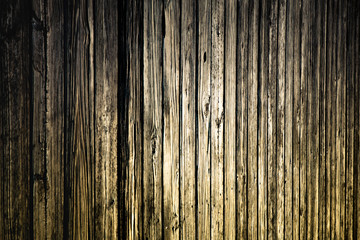 Weathered boardwalk planks of wood with heavy grain and vintage tone