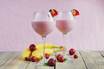 Delicious strawberry and banana smoothie, yogurt or milk shake w
