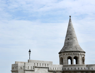 Fototapeta premium Top of the ancient building on the blue sky background