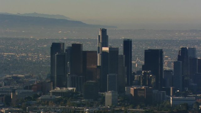 Flying past downtown Los Angeles with smog in valley. Shot in 2008.