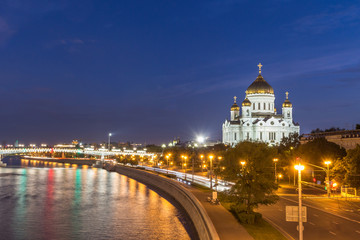 Fototapeta na wymiar Cathedral of Christ the Saviour and Patriarshy Bridge at dusk