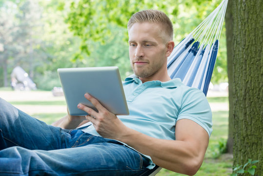 Man Using Digital Tablet