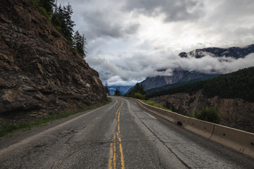 Windy Road in the mountains of British Columbia. Taken on Duffey Lake Rd near Lillooet, during a cloudy early morning.