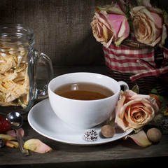 Cup of tea on vintage wooden board