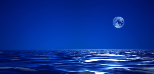 Full moon over cold night water