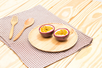 Passion fruit on wood table