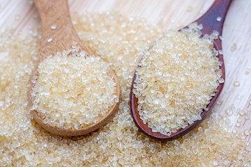 brown sugar heap on wooden table