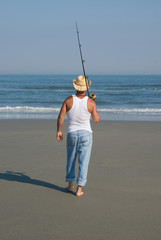 Man going Surf-Fishing on the Jersey Shore