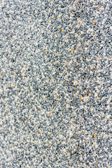 Cement mixed small gravel stone wall or floor texture background