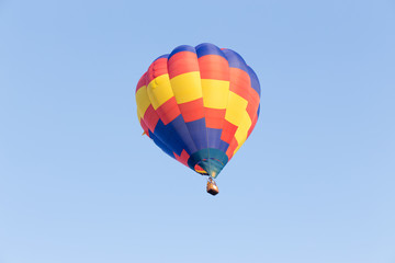 Colorful hot air balloon on blue sky