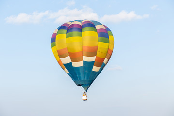 Fototapeta premium Colorful hot air balloon on blue sky