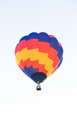 Fototapeta premium Colorful hot air balloon on blue sky