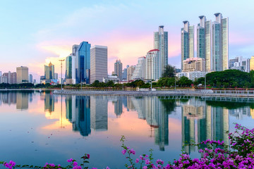 Fototapeta na wymiar Bangkok cityscape twilight at benjakitti public park on midtown