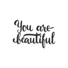 You are beautiful - hand drawn lettering phrase, isolated on the white background. Fun brush ink inscription for photo overlays, typography greeting card or t-shirt print, flyer, poster design.