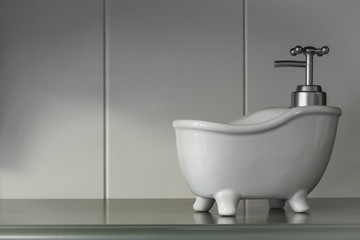 Vintage small bathtub soap dispenser