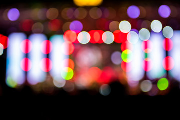 Fototapeta premium Defocused entertainment concert lighting on stage, blurred disco