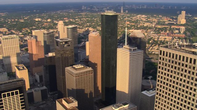 Close flight past layered skyscrapers of downtown Houston. Shot in 2007.