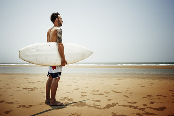Surfboard Surfer Outdoor Sport Tropical Ocean Concept - obrazy, fototapety, plakaty