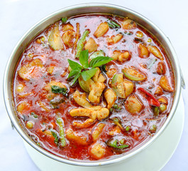 Jungle curry chicken in hot pot, Thai traditional food..