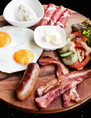 Breakfast - fried egg with bacon and cheese