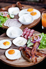 Breakfast - fried egg with bacon and cheese