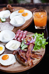 Breakfast - fried egg with bacon and cheese