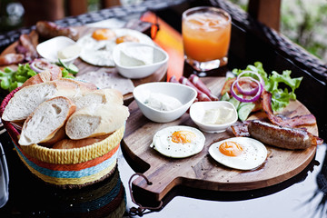 Breakfast - fried egg with bacon and cheese