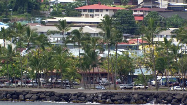 Slight zoom-out on waterfront street in Hilo, Hawaii. Shot in 2010.