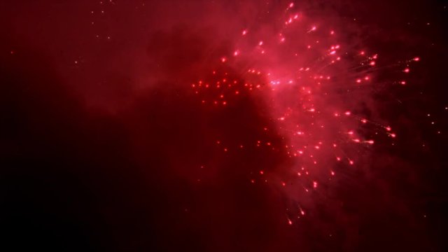 Fireworks spraying bright pink sparks