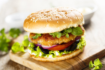 Burger with chicken and olives