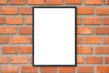 Mock up blank poster picture frame on brick wall.