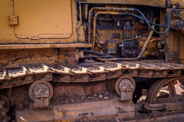 Fototapeta na wymiar Rusted Dirt Covered Industrial Machine