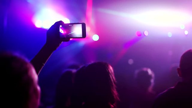 Person Records Rock Concert On Cellphone In The Club