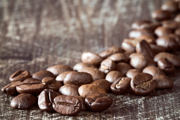 Heap of coffee beans close-up.