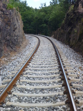 railwai track between steep rocks