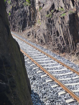 railwai track between steep rocks