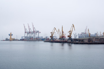 Fototapeta na wymiar Cargo crane sea port