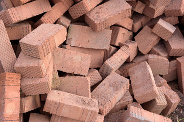 Piles of Red Construction Bricks