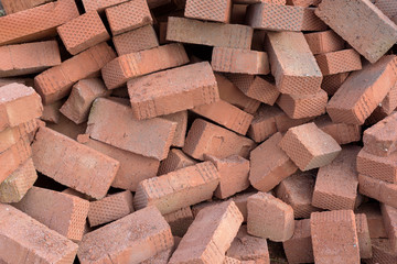 Piles of Red Construction Bricks