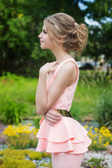 Fototapeta na wymiar young beautiful girl in an evening dress on nature